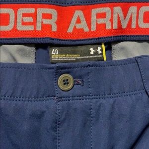 Under Armour golf shorts.
